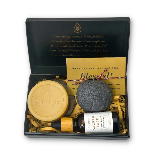 Moringa cleansing round bar, konjac sponge and 30ml Face oil in a black gift box