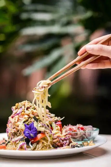 Plate of Raw Pad Thai from Sayuri's Healing Food Cafe in Bali. Recipe in Bali Vegan Book