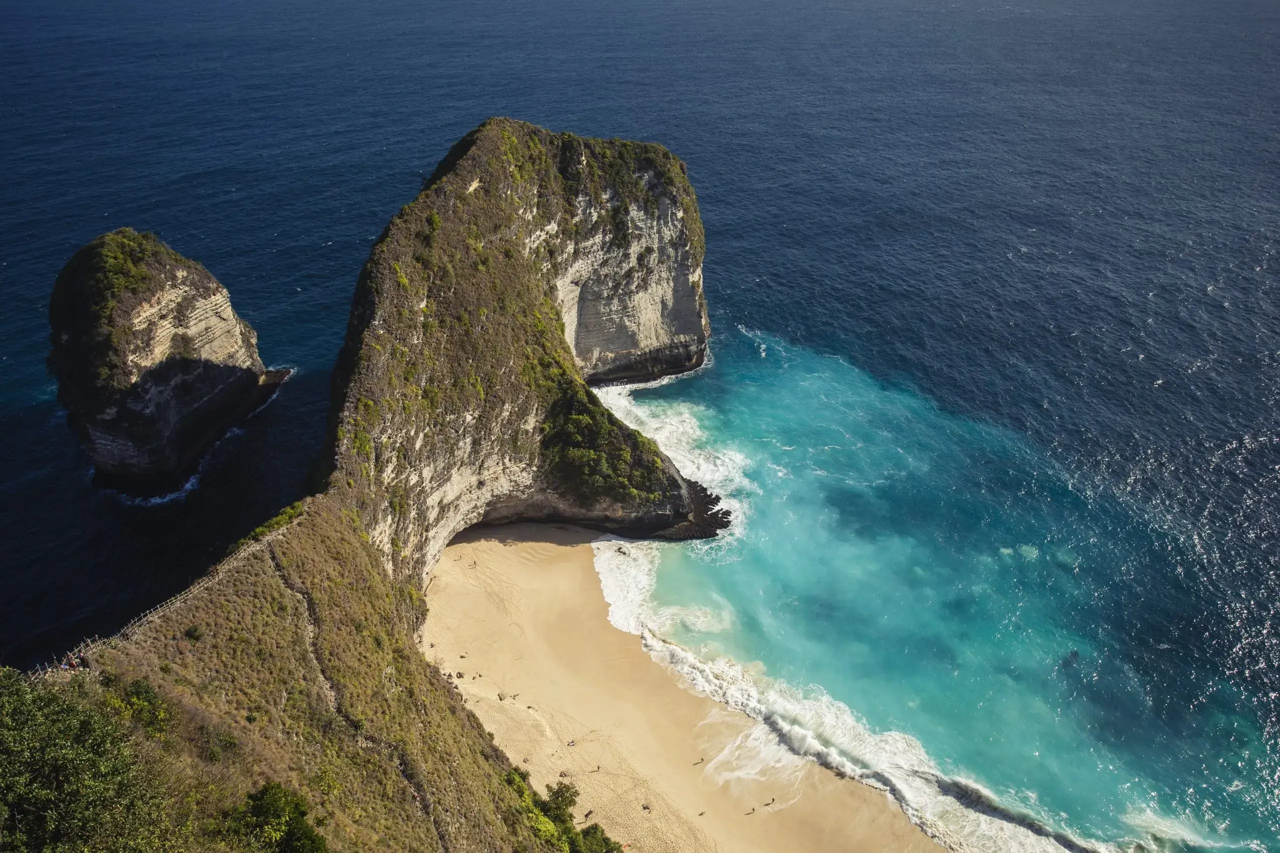 Looking down on t-rex beach in Nusa Penida from the Bali Vegan Book